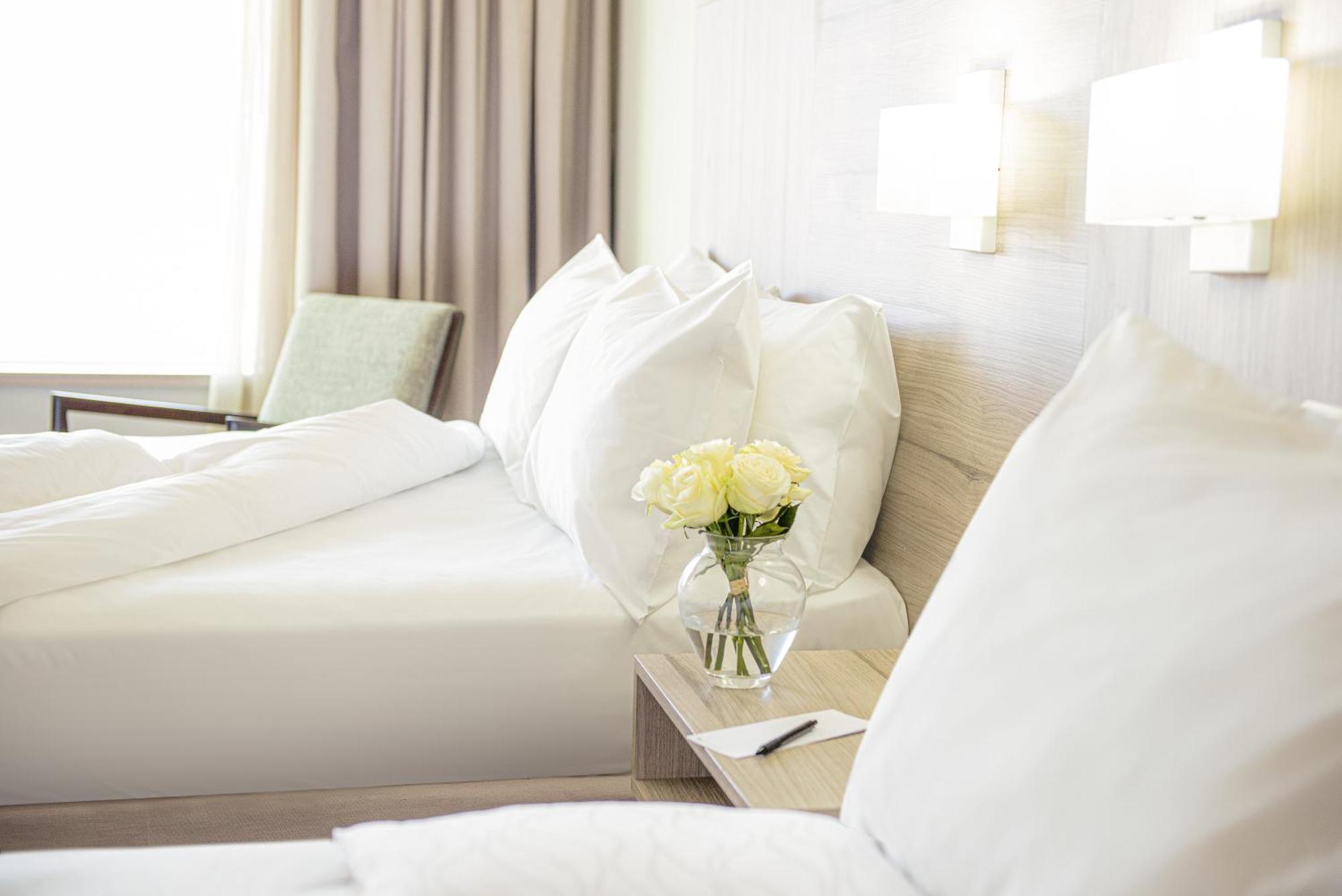 Pullman Santiago Vitacura 외부 사진 A bedroom at The Ivy Hotel